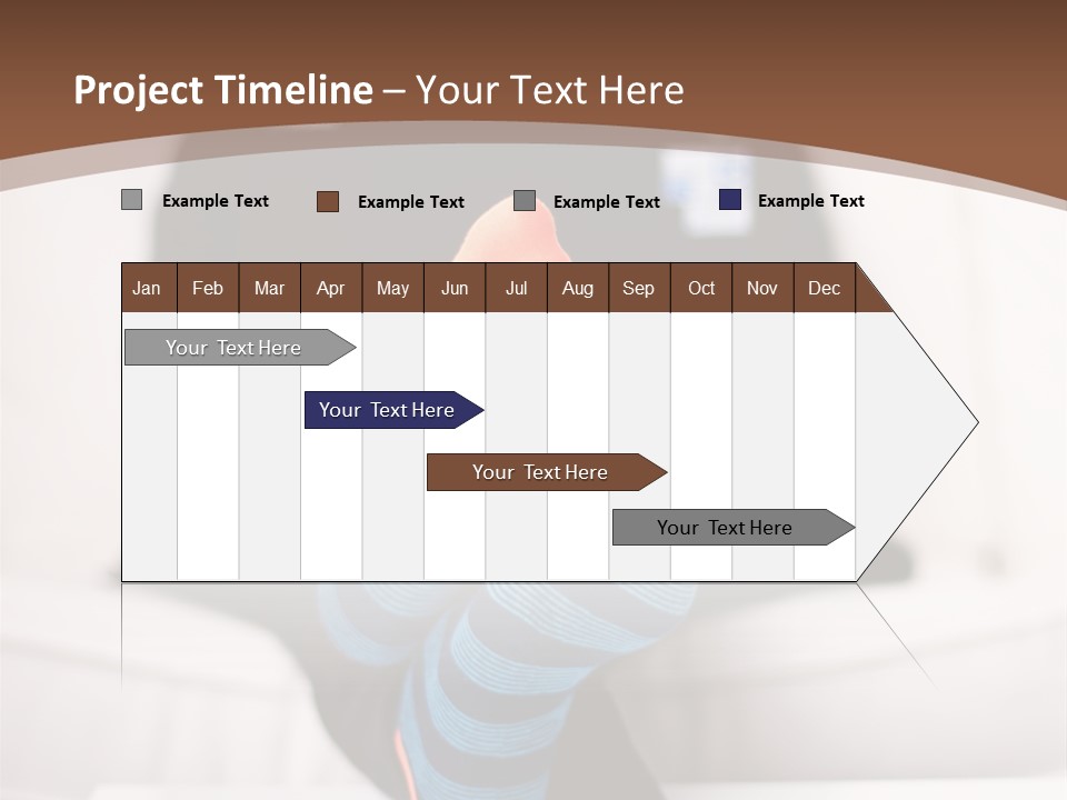 A Man Sitting In Front Of A Laptop Computer PowerPoint Template
