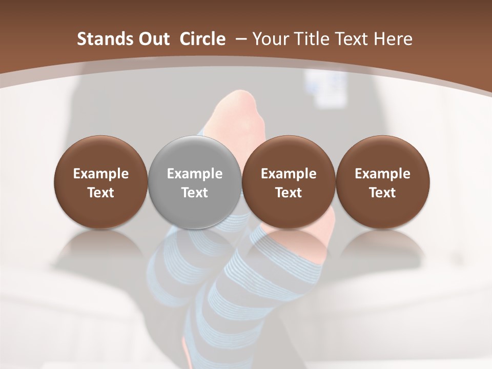 A Man Sitting In Front Of A Laptop Computer PowerPoint Template