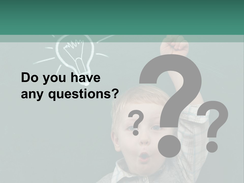 A Young Boy Pointing At A Light Bulb On A Chalkboard PowerPoint Template