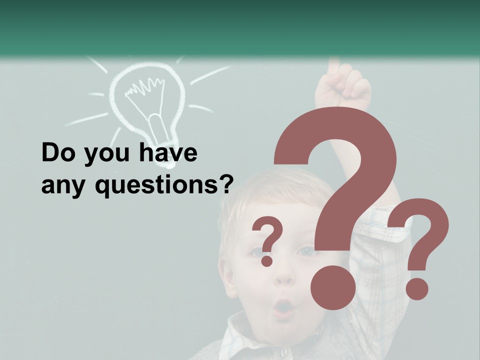 A Young Boy Pointing At A Light Bulb On A Chalkboard PowerPoint Template