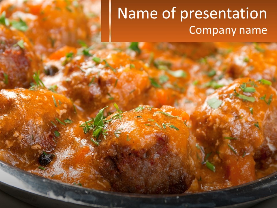 A Pan Filled With Meatballs Covered In Cheese PowerPoint Template