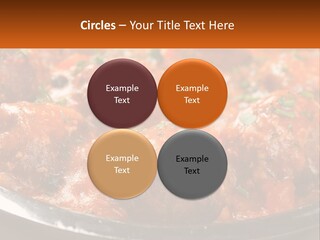 A Pan Filled With Meatballs Covered In Cheese PowerPoint Template