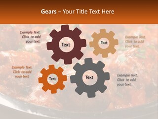 A Pan Filled With Meatballs Covered In Cheese PowerPoint Template