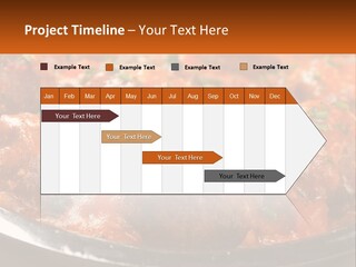 A Pan Filled With Meatballs Covered In Cheese PowerPoint Template