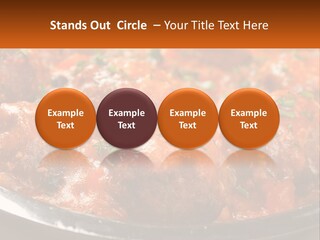 A Pan Filled With Meatballs Covered In Cheese PowerPoint Template