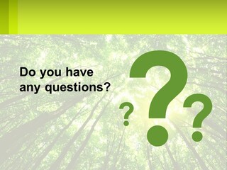 A Green Forest With The Sun Shining Through The Trees PowerPoint Template