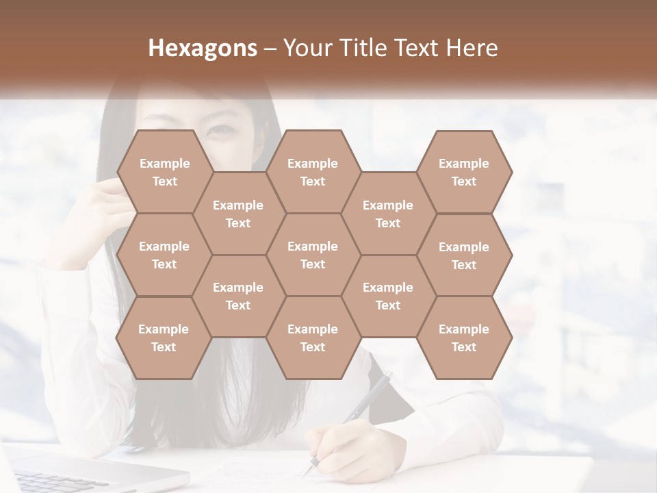 A Woman Sitting At A Desk In Front Of A Laptop Computer PowerPoint Template