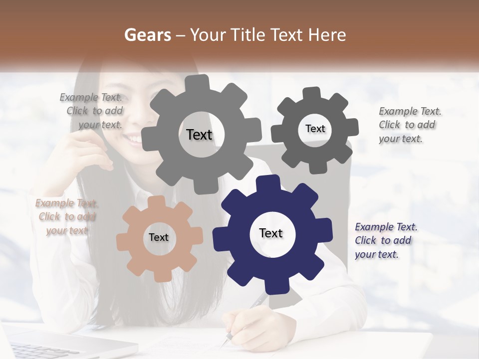 A Woman Sitting At A Desk In Front Of A Laptop Computer PowerPoint Template