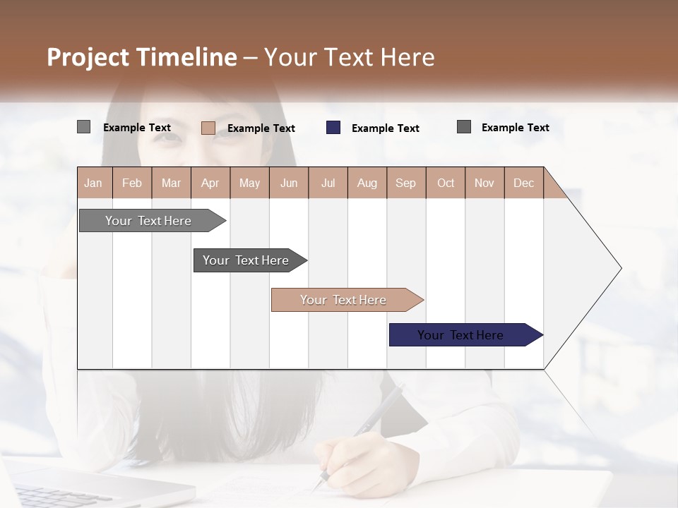 A Woman Sitting At A Desk In Front Of A Laptop Computer PowerPoint Template