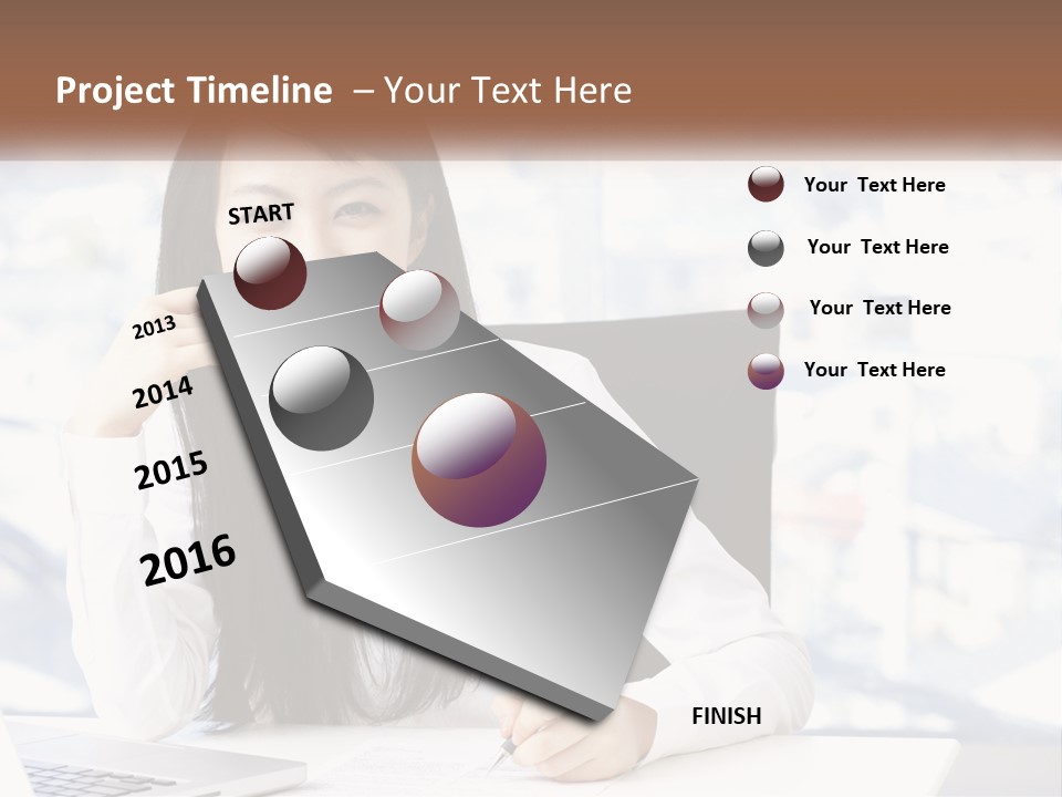 A Woman Sitting At A Desk In Front Of A Laptop Computer PowerPoint Template