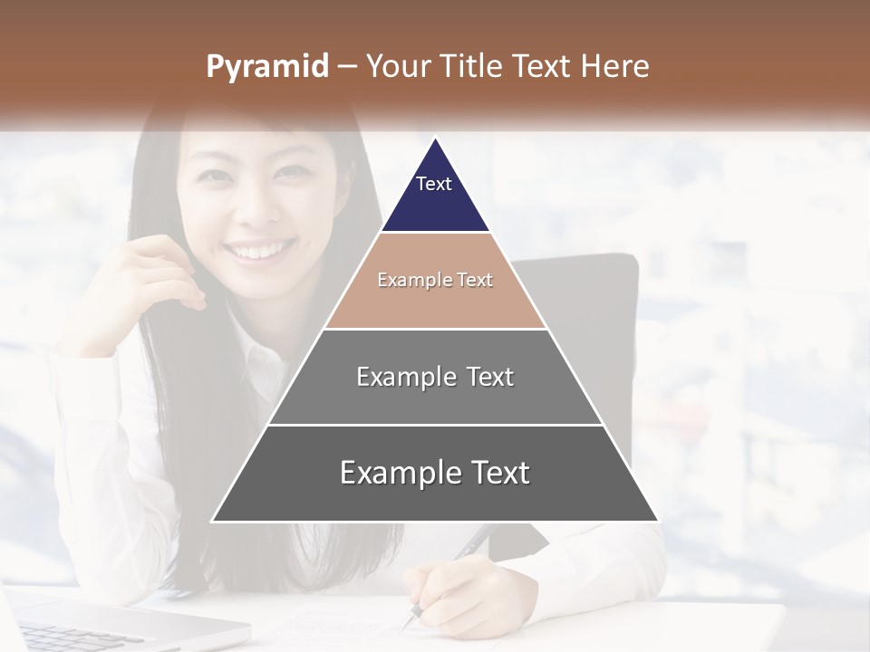 A Woman Sitting At A Desk In Front Of A Laptop Computer PowerPoint Template