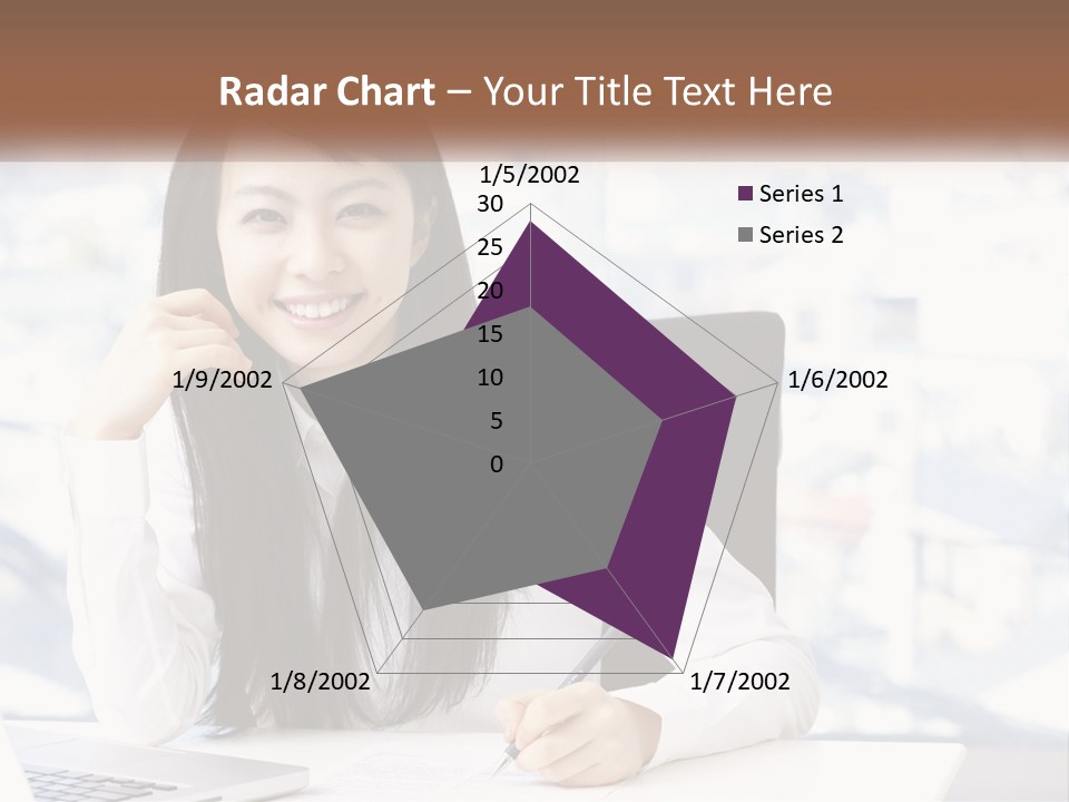 A Woman Sitting At A Desk In Front Of A Laptop Computer PowerPoint Template