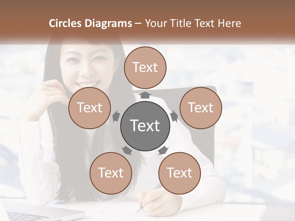 A Woman Sitting At A Desk In Front Of A Laptop Computer PowerPoint Template