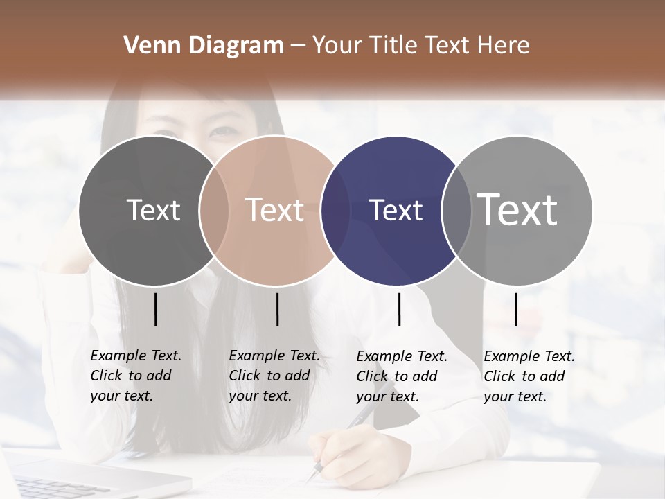 A Woman Sitting At A Desk In Front Of A Laptop Computer PowerPoint Template