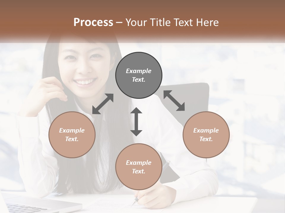 A Woman Sitting At A Desk In Front Of A Laptop Computer PowerPoint Template