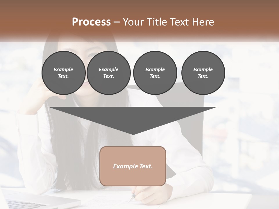 A Woman Sitting At A Desk In Front Of A Laptop Computer PowerPoint Template