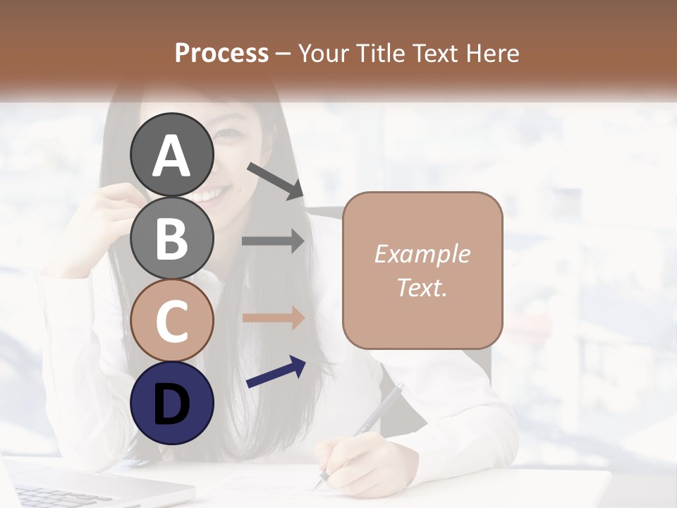 A Woman Sitting At A Desk In Front Of A Laptop Computer PowerPoint Template