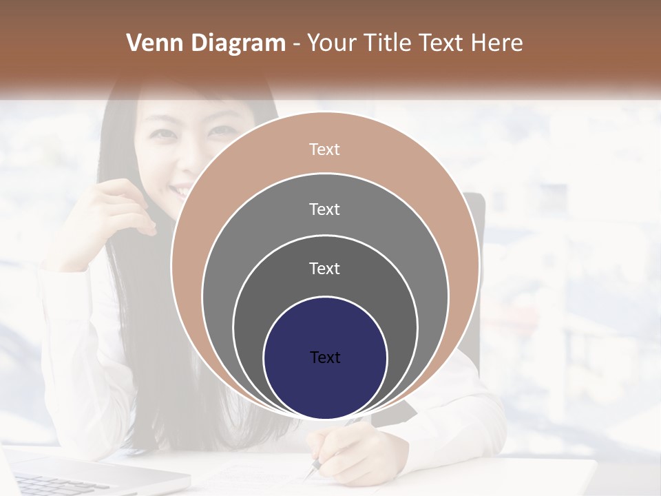 A Woman Sitting At A Desk In Front Of A Laptop Computer PowerPoint Template