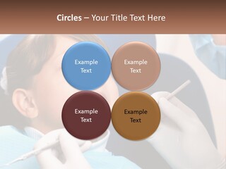 A Young Boy Getting His Teeth Checked By A Dentist PowerPoint Template