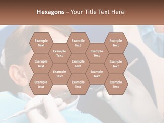 A Young Boy Getting His Teeth Checked By A Dentist PowerPoint Template