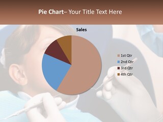 A Young Boy Getting His Teeth Checked By A Dentist PowerPoint Template