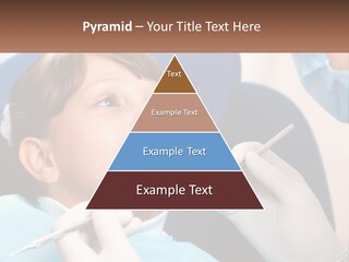A Young Boy Getting His Teeth Checked By A Dentist PowerPoint Template