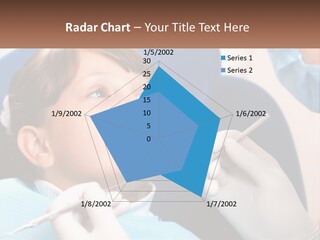 A Young Boy Getting His Teeth Checked By A Dentist PowerPoint Template