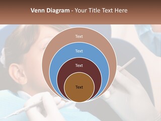 A Young Boy Getting His Teeth Checked By A Dentist PowerPoint Template