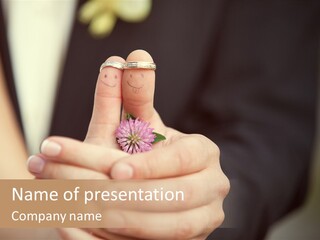 A Man And A Woman Holding A Flower In Their Hands PowerPoint Template