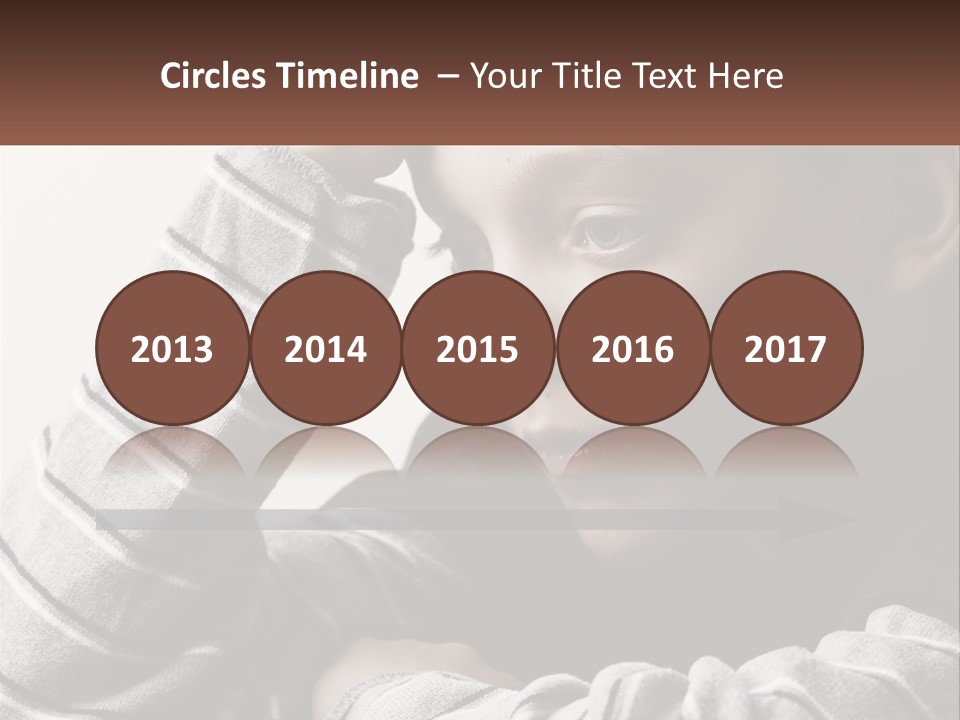 A Young Boy Holding His Head In His Hands PowerPoint Template