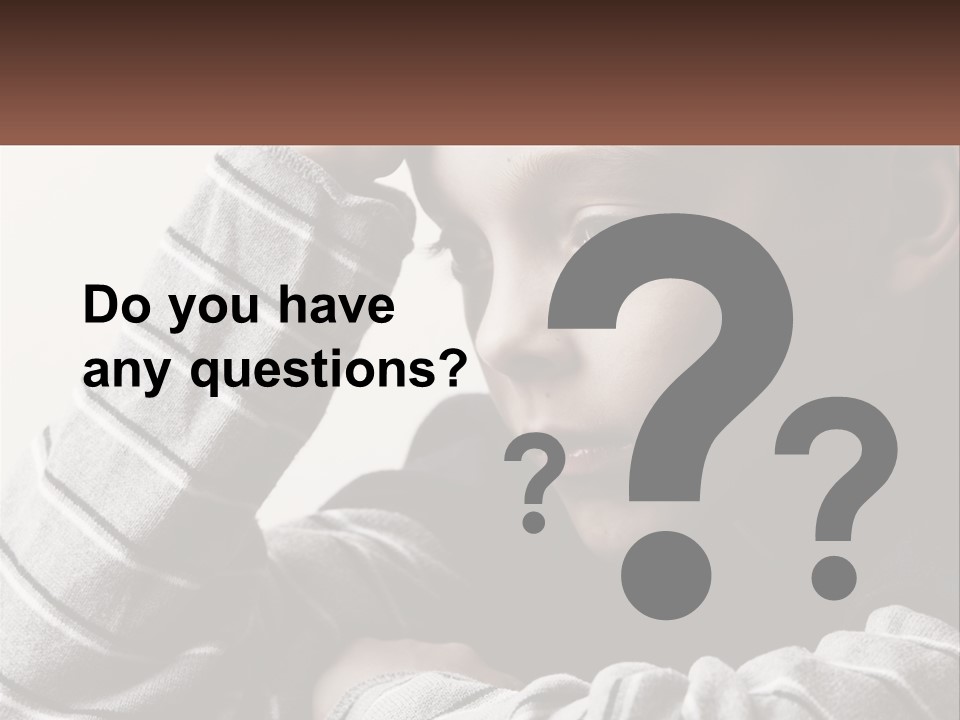 A Young Boy Holding His Head In His Hands PowerPoint Template