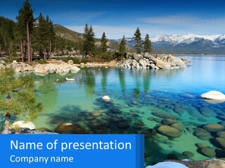 A Body Of Water Surrounded By Rocks And Trees PowerPoint Template