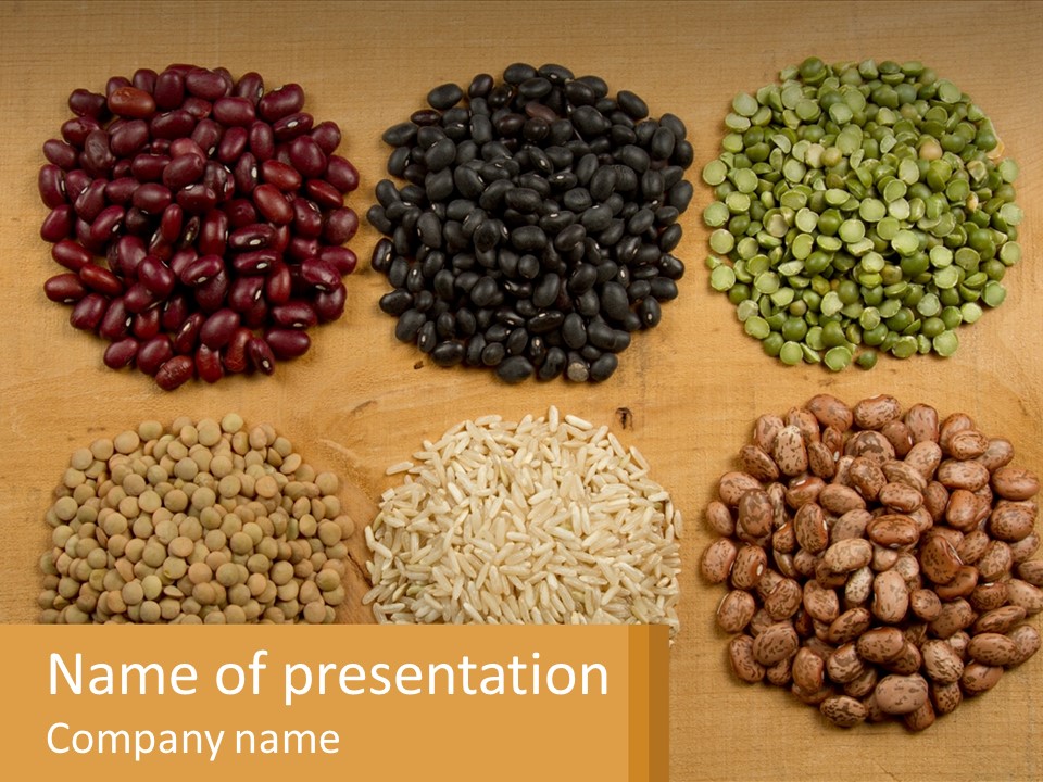 A Wooden Table Topped With Lots Of Different Types Of Beans PowerPoint Template