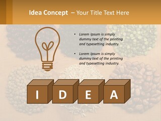 A Wooden Table Topped With Lots Of Different Types Of Beans PowerPoint Template