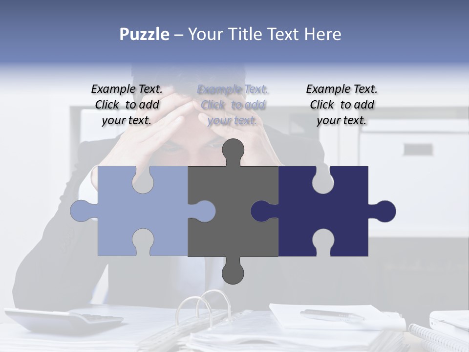 A Man Sitting At A Desk With His Hands On His Head PowerPoint Template