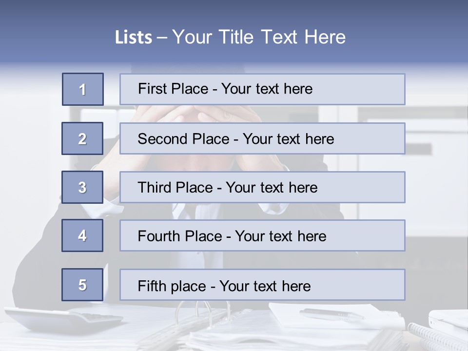 A Man Sitting At A Desk With His Hands On His Head PowerPoint Template