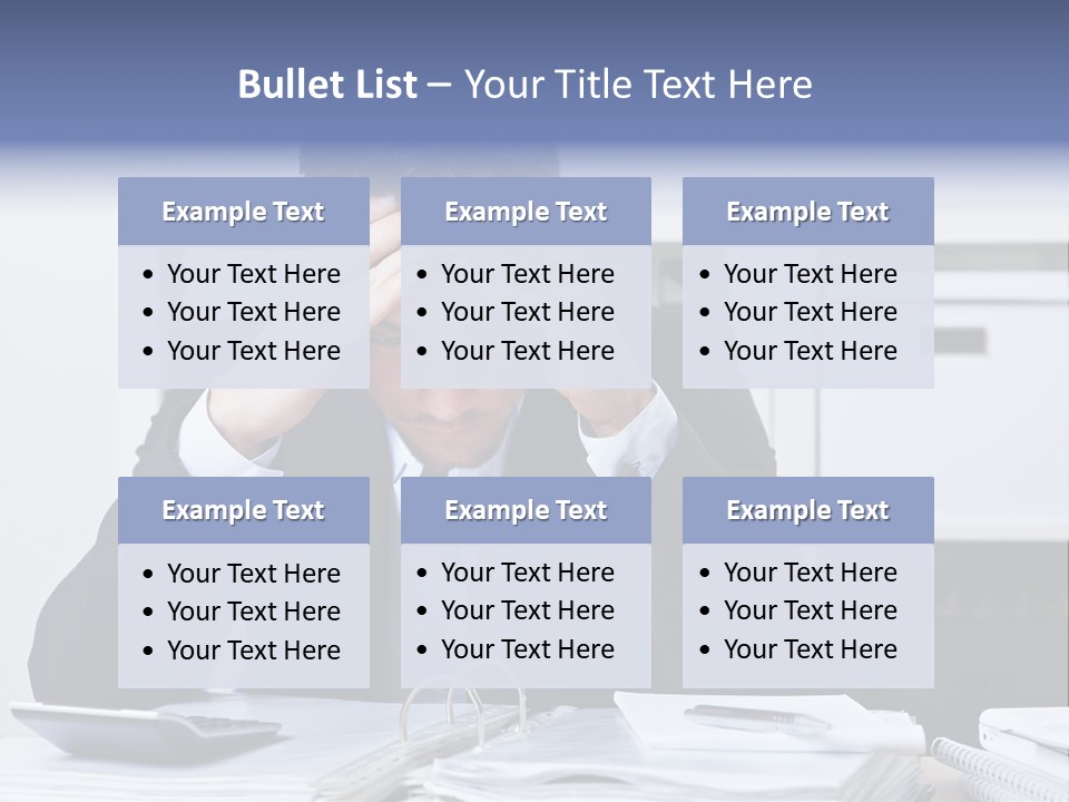 A Man Sitting At A Desk With His Hands On His Head PowerPoint Template