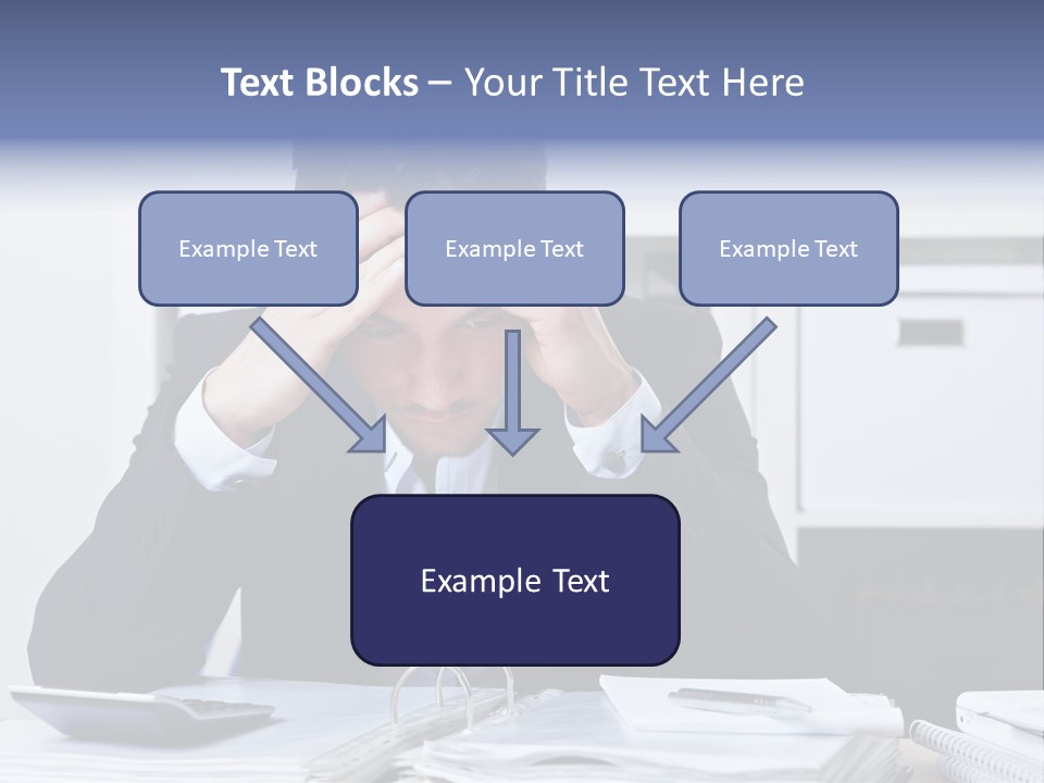 A Man Sitting At A Desk With His Hands On His Head PowerPoint Template