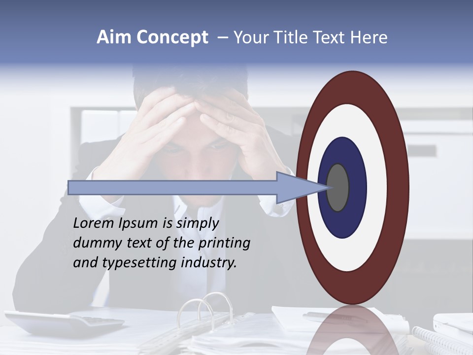 A Man Sitting At A Desk With His Hands On His Head PowerPoint Template