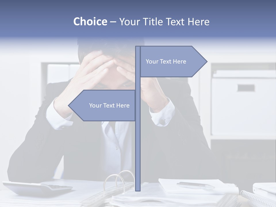 A Man Sitting At A Desk With His Hands On His Head PowerPoint Template