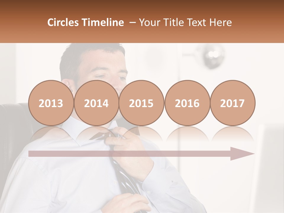 A Man Sitting In A Chair Adjusting His Tie PowerPoint Template