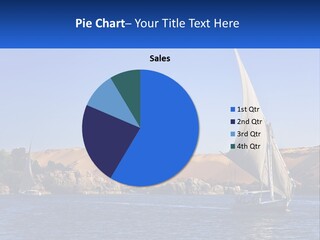 A Sailboat In The Middle Of A Body Of Water PowerPoint Template