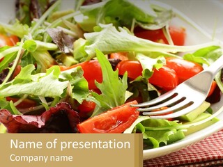 A Salad With Tomatoes And Lettuce On A Plate With A Fork PowerPoint Template