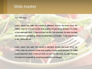 A Salad With Tomatoes And Lettuce On A Plate With A Fork PowerPoint Template