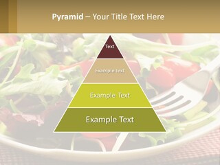 A Salad With Tomatoes And Lettuce On A Plate With A Fork PowerPoint Template
