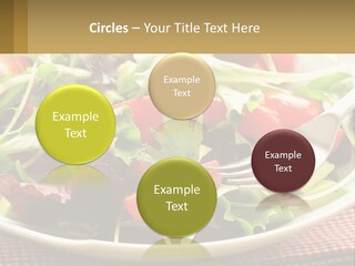 A Salad With Tomatoes And Lettuce On A Plate With A Fork PowerPoint Template