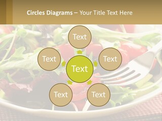 A Salad With Tomatoes And Lettuce On A Plate With A Fork PowerPoint Template