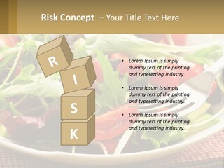 A Salad With Tomatoes And Lettuce On A Plate With A Fork PowerPoint Template