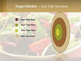 A Salad With Tomatoes And Lettuce On A Plate With A Fork PowerPoint Template