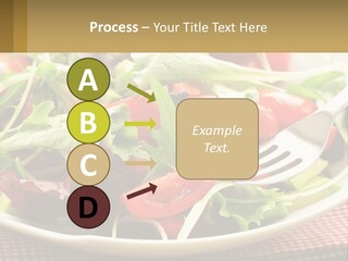 A Salad With Tomatoes And Lettuce On A Plate With A Fork PowerPoint Template